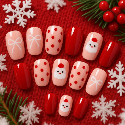 Festive Red & Nude Press-On Nails – Santa, Bow & Polka Dot Design.