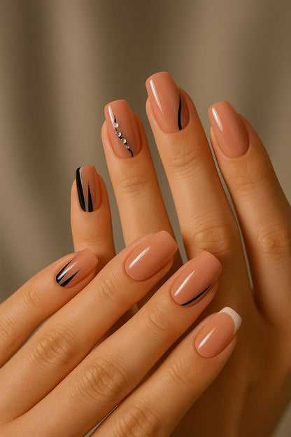 Nude & Black Press-On Nails – Rhinestone Accents & French Tip Design