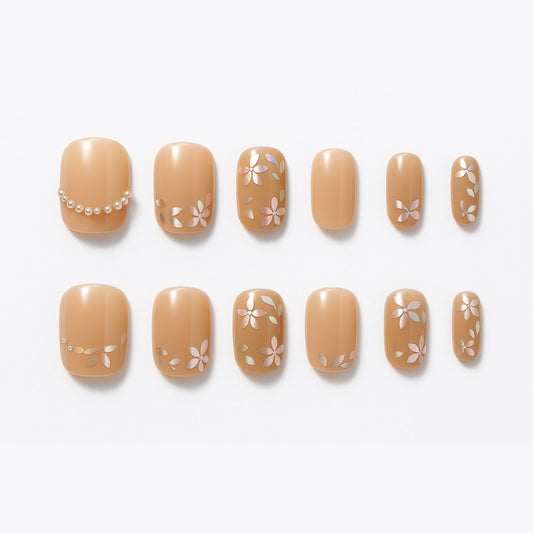 Nude Blossom Press-On Nails – Floral & Pearl Accent Design.