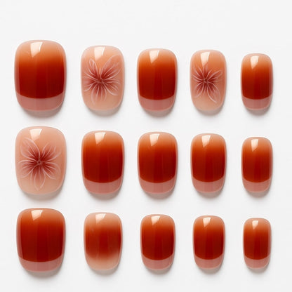 Red Ombre Press-On Nails – Floral Accent Design.